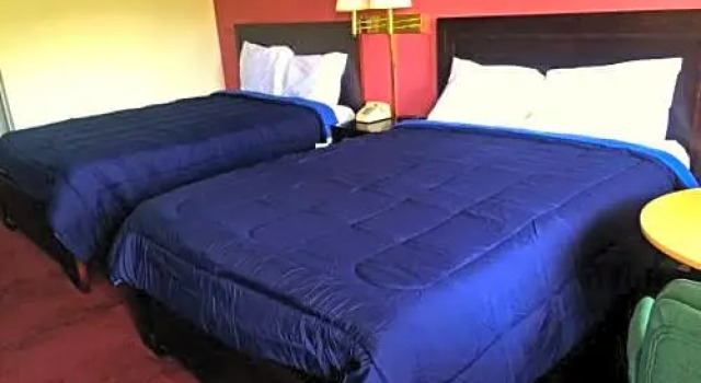 Четырёхместный номер Deluxe SUNSET INN