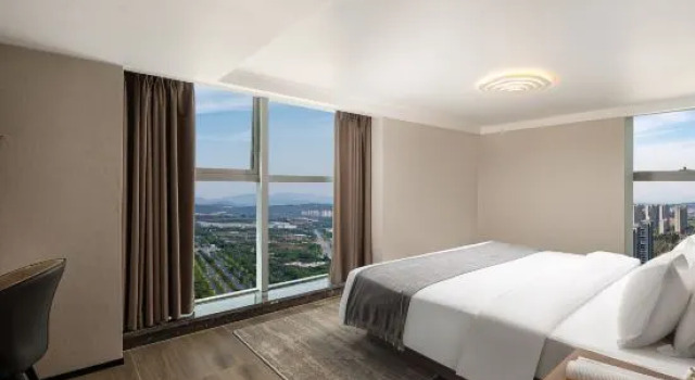 Люкс Executive Kunming Jun'an Hotel (University Town High-speed Railway South Station)