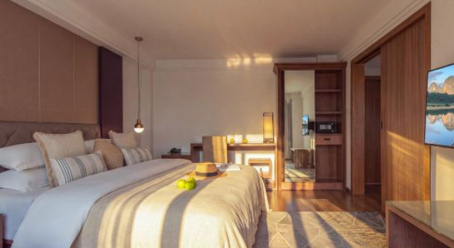 Люкс с 2 комнатами с видом на реку Yangshuo Yuelv River View Vacation Apartment