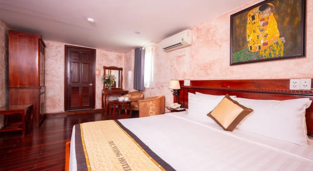 Номер Deluxe Duc Vuong Saigon Hotel - Bui Vien