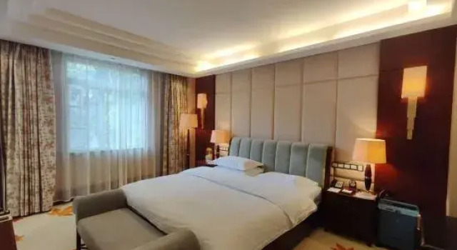 Люкс Yunnan Zhenzhuang Guest House