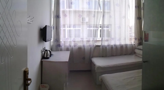 Linhai Express Hotel, Забронировать Отель Фушань Яньтай