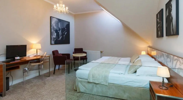 Clássico quarto Hotel Aplaus