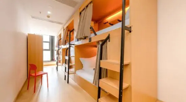Кровать в общем номере Kepler Planet Youth Hostel (Hangzhou Wulin Square Baoshanqiao Metro Station)