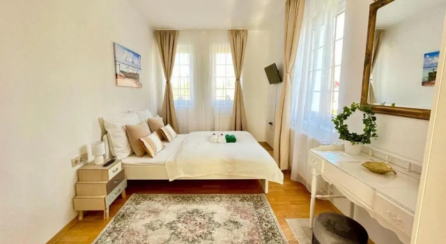 Апартаменты Libás Apartman