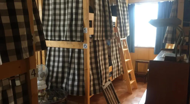 Кровать в общем номере Guest house daisho oshiro asobi