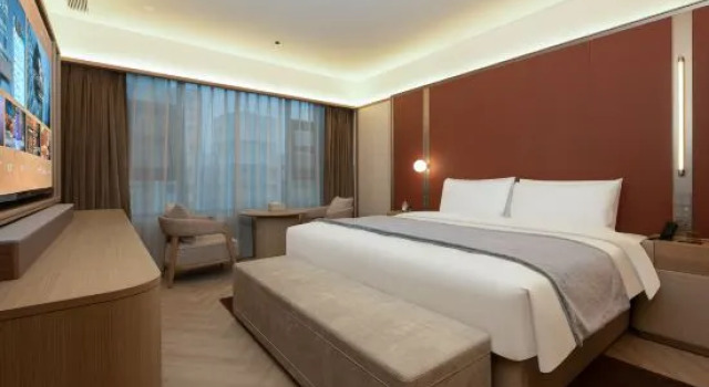 Люкс Executive Xi'an Ming City Wall Yongxingfang Crystal Orange Hotel