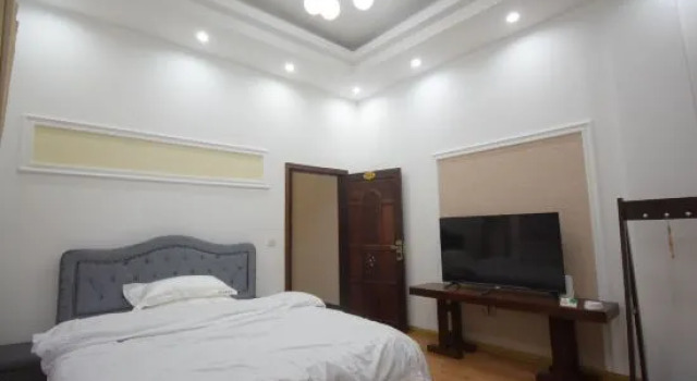 Люкс с 2 комнатами Dongxing Guomen e Homestay
