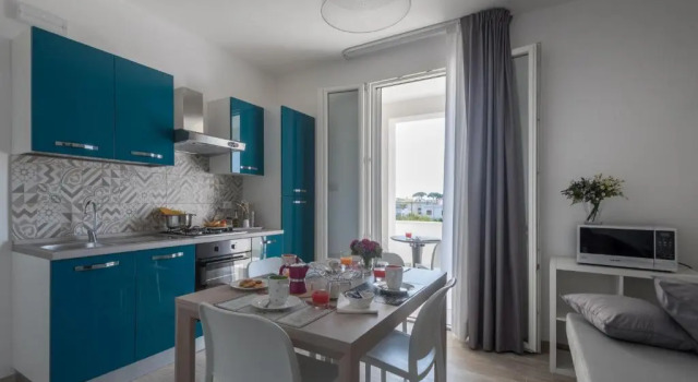 Апартаменты Пентхаус с балконом и с видом на сад Calura Residence