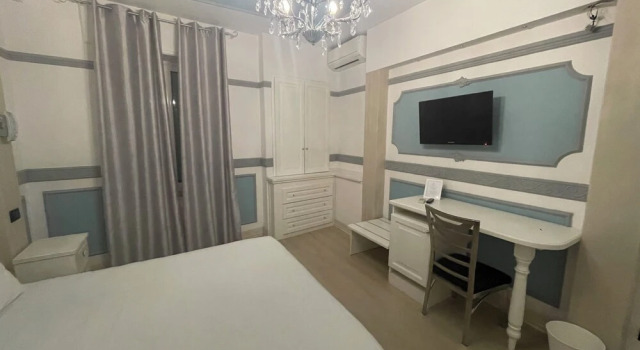 Четырёхместный номер Standard Hotel Central Giacomini
