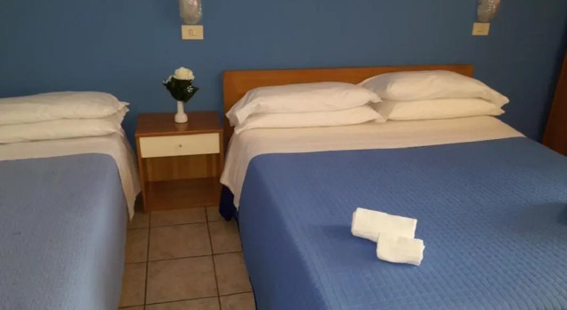 Трёхместный номер Albergo Papillon