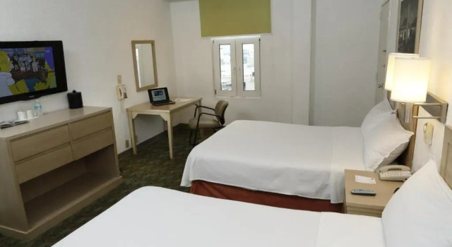 Четырёхместный номер Executive Hotel Monterrey Macroplaza