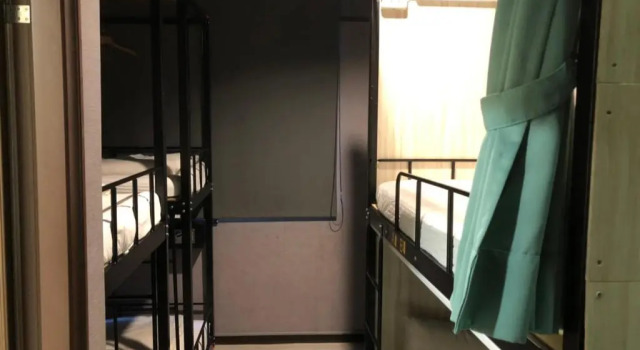 Кровать в общем номере Backpackers Hostel - Ximen