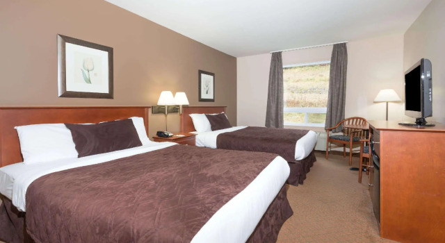 Четырёхместный номер Standard Super 8 by Wyndham Sainte Agathe Des Monts