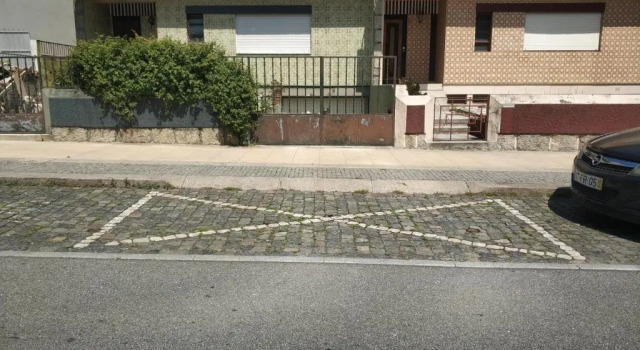 Кровать в общем номере Quartos no Apartamento da Rosa