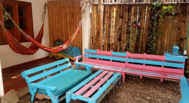 Кровать в общем номере Oasis Hostal Restaurante