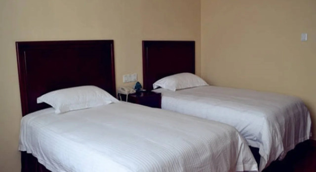 GreenTree Inn Zaozhuang Tengzhou Railway Station Middle Fuqian Road Shell Hotel, Book Hotel Hoteller i Tengzhou med parkering, Parkering