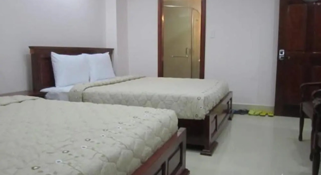 Четырёхместный семейный номер Standard Hoa Bao Hotel