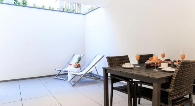 Апартаменты Apartment Westend mit 4-Zimmern, Aussenbereich und eigenem Parkplatz