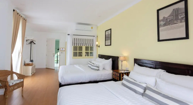 Четырёхместный семейный номер Standard с балконом Nai Suan Bed and Breakfast