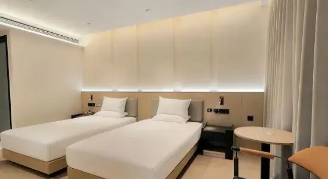 Двухместный люкс c 1 комнатой Nanchang Huixin Holiday Hotel (Nanchang Station Hengmao Dream Times Square)