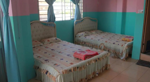 Четырёхместный номер Standard с балконом Huỳnh Hương Guesthouse