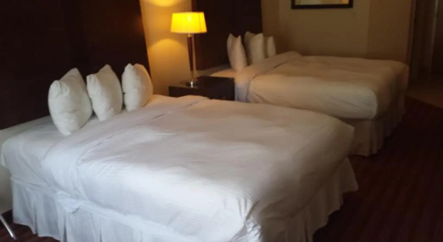 Четырёхместный номер Standard Sigma Inn & Suites Hudsons Hope