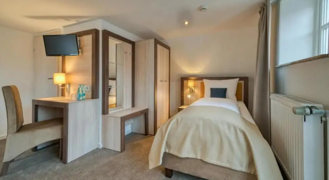Трёхместный номер Economy Hotel Am Fischmarkt