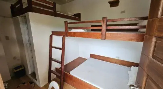 Кровать в общем номере San Juan Hostel