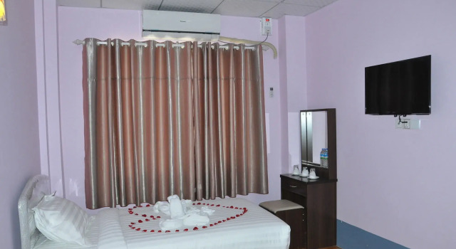 Man Shwe Li Hotel, Prenota Hotel Mandalay Myanmar, vicino a Jade Market