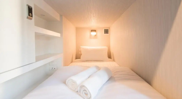 Кровать в общем номере LAF Hotel Aree