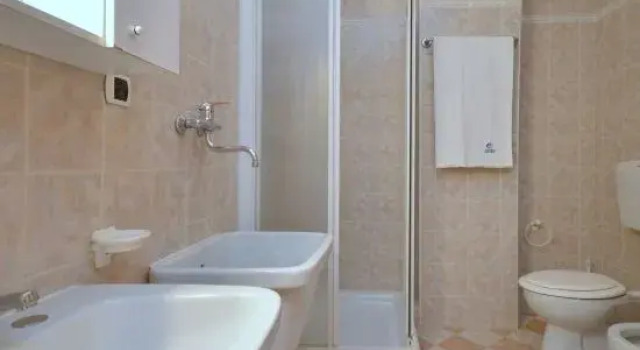 Spacious Apartment 50mt from the Beach, Забронировать Апартаменты/квартира Бибионе-Пинеда Венето
