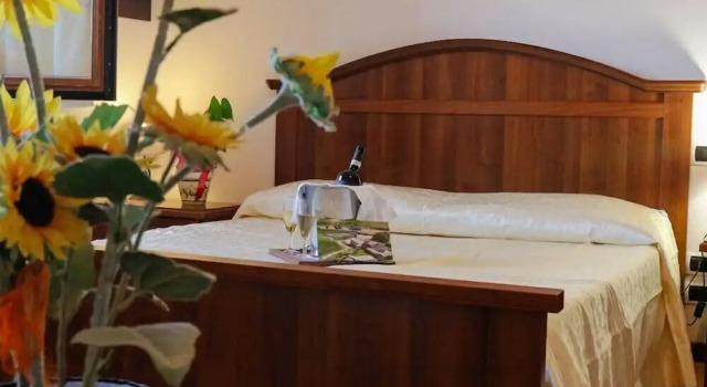 Четырёхместный номер Standard Agriturismo Oasi Biologica