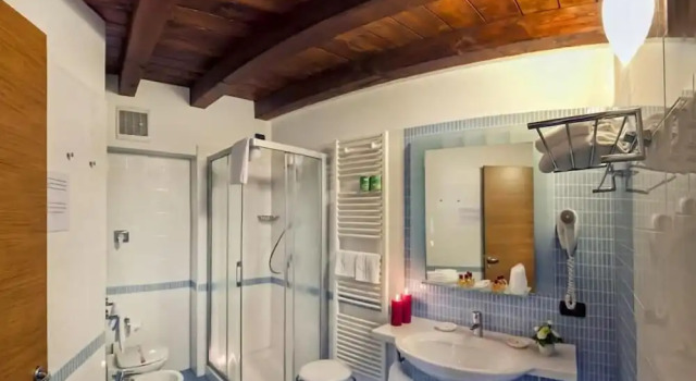 Четырёхместный люкс Albergo Antica Corte Marchesini