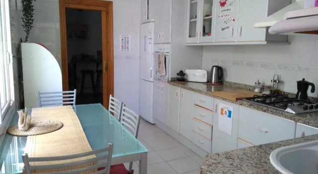 Кровать в общем номере La Pita Beach house