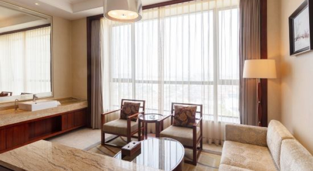 Кровать в общем номере Luyiyuan International Hotel