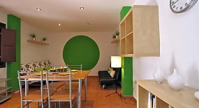 Кровать в общем номере с 2 комнатами Apartamentos Nest Flats Casa de la Alberca