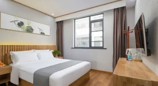 Трёхместный люкс Deluxe с красивым видом из окна Wangxia Homestay (Jiuhuashan Transfer Center)