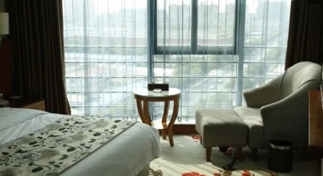 Семейный люкс Business Qinqingshu Hotel