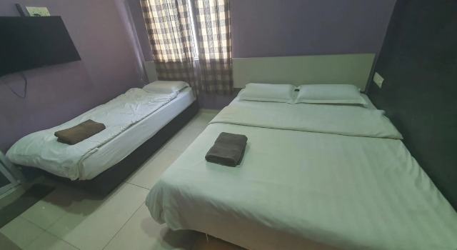 Семейный люкс OYO 90177 Byond Hotel