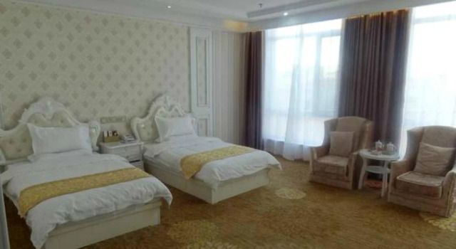 Zhang Ye Long Sheng Holiday Hotel, Varaa Hotelli Zhangye Gansu