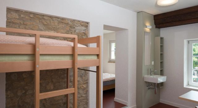Кровать в общем номере Avenches Youth Hostel