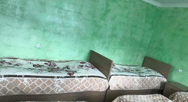 Кровать в общем номере Guest House Luka