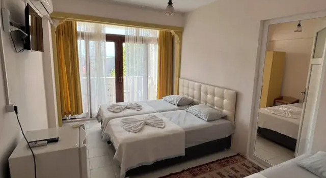 Standardowy rodzinny pokój i balkonem i z widokiem na morze İnka Otel