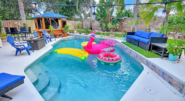 Urban Oasis W/hot Tub, Heated Pool And Private Movie Theater 2 Bedroom Home by RedAwning, Book Vacation Home Melbourne Beach Space Coast