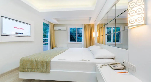 Четырёхместный номер Standard с видом на сад Hotel Mavi Deniz