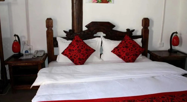 Indulged in Lijiang Inn, Забронировать Отель Лицзян Юньнань, рядом с Улица Сквер-стрит Древнего города Даянь