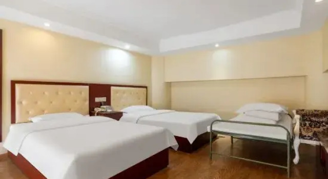 Кровать в общем номере Di Yi Impression Hotel (Binhu Convention and Exhibition Center Store)