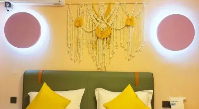 Кровать в общем номере Xujieyoujianminsu Homestay