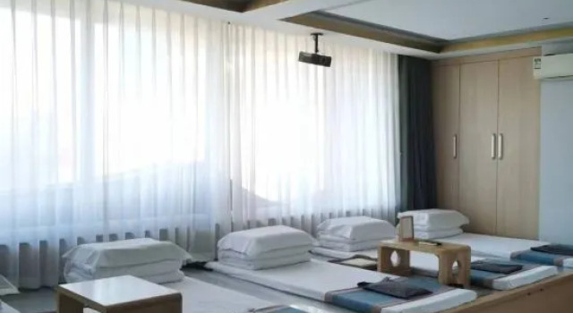 Кровать в общем номере Changchun Fushoude Business Hotel
